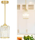 Gold Kitchen Pendant Lights Over Island by Unknown