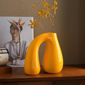 Yellow Ceramic Vase – Glossy Modern Sculptural Décor, Arch Handle Artistic by PROBENEX-Elevateyourhomedecor