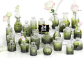 Mini Bud Vases As Wedding Centerpieces by Zipper
